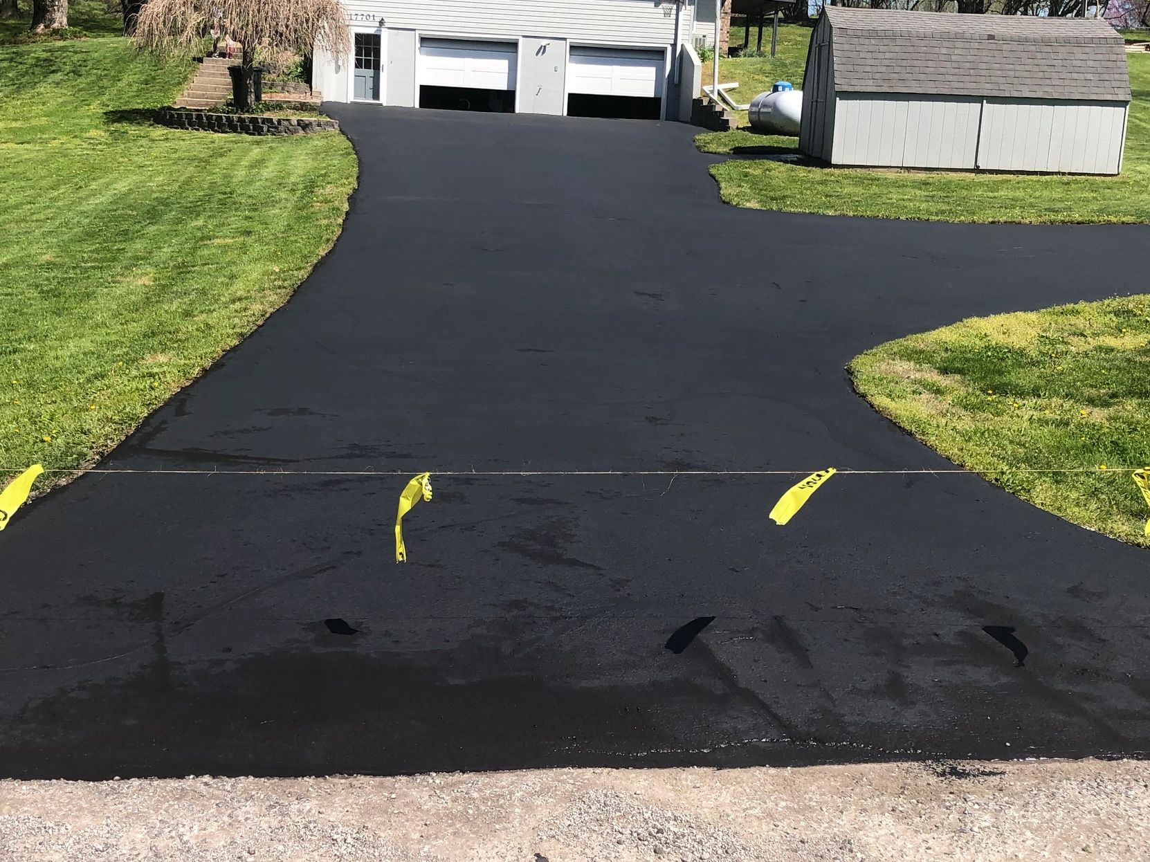 A freshly seal coated driveway