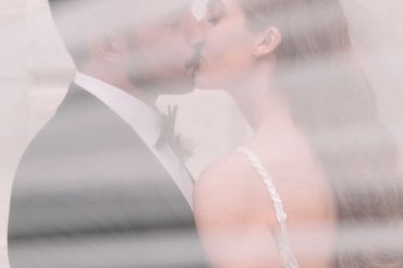 Kissing Bride and Groom Wedding Photo from Wedding Planner in Downtown Detroit Michigan