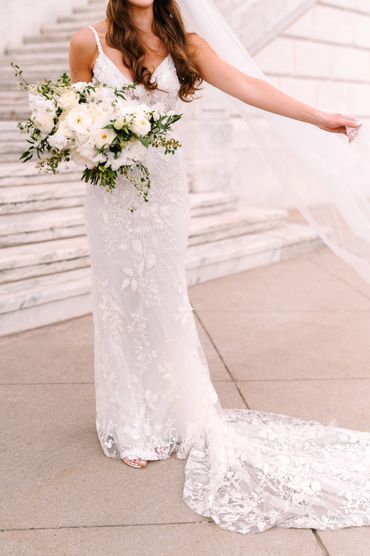 Bridal Photo outside of DIA Detroit Michigan with White flower bouquet