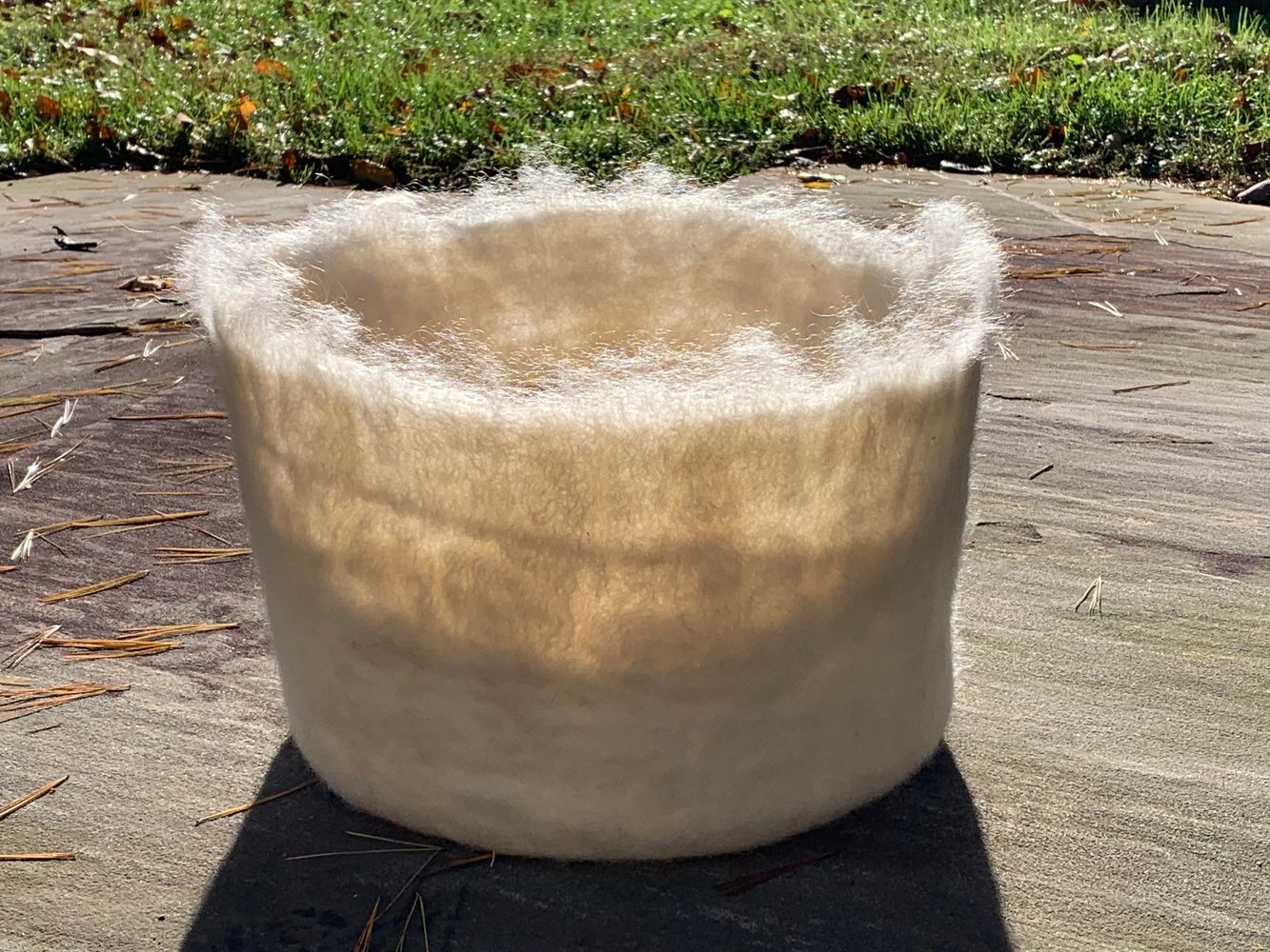 White Beauty cream natural colored wool wet-felted with internal spiral basket reed Show "Favorite"