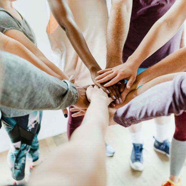 A group of people holding hands