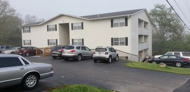 A view of the Green Oaks Apartments, LLC apartment complex in Hollister, Missouri.