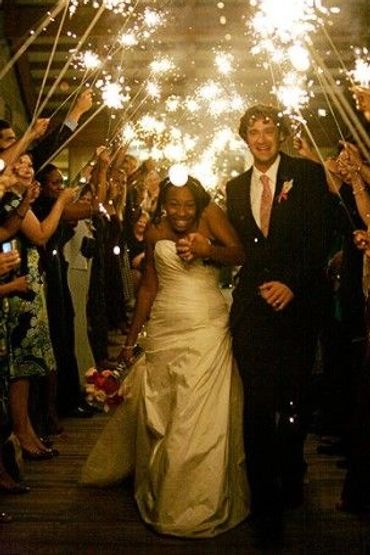 Sparklers always ad something extra to a wedding reception.