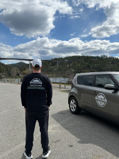 Mobile locksmith unlocking vehicle in Spokane