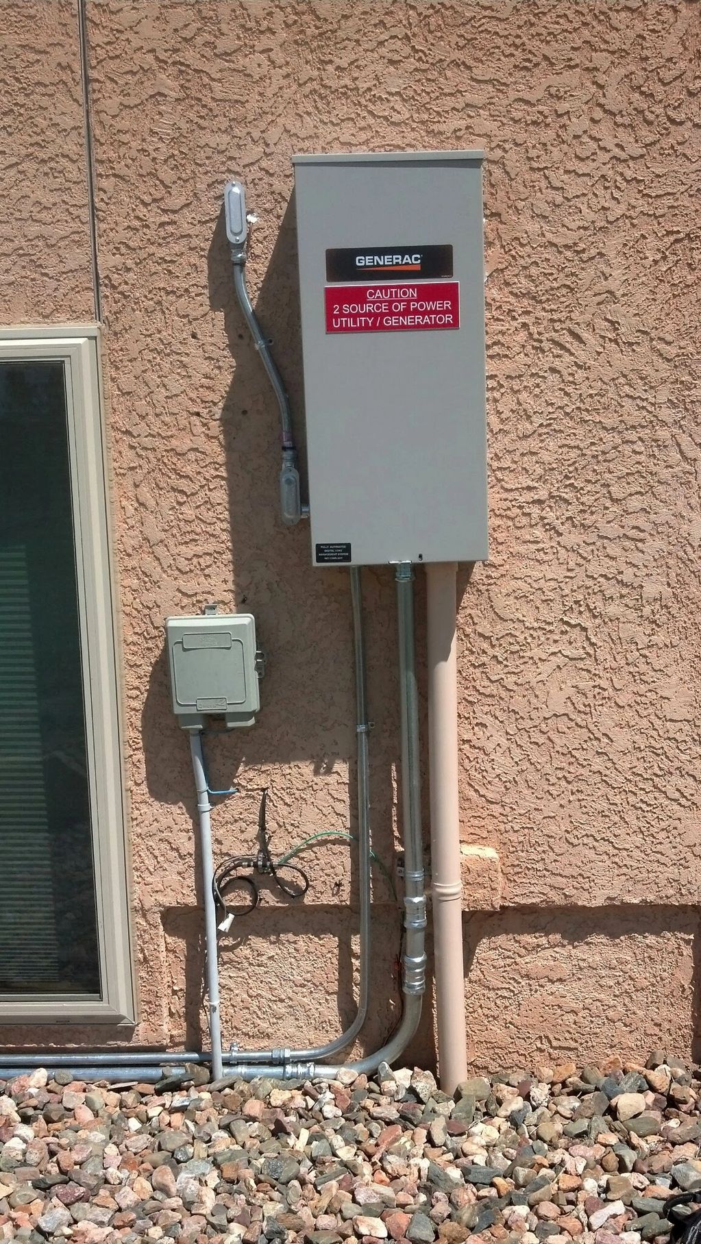 Automatic transfer switch for a backup generator