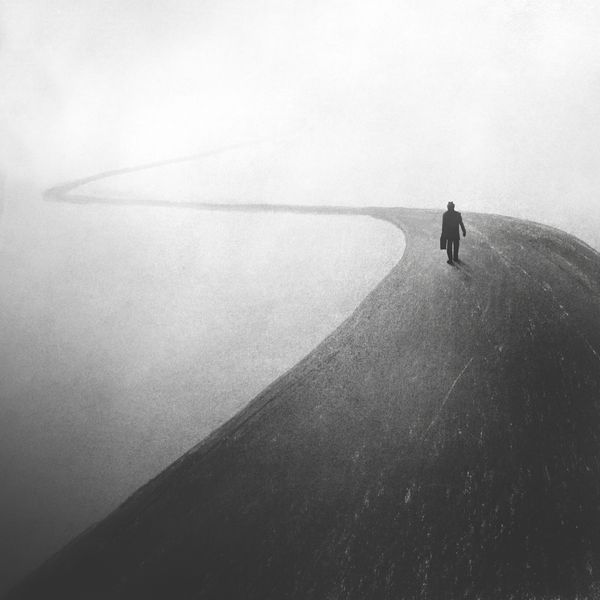 Picture of a person walking on a road