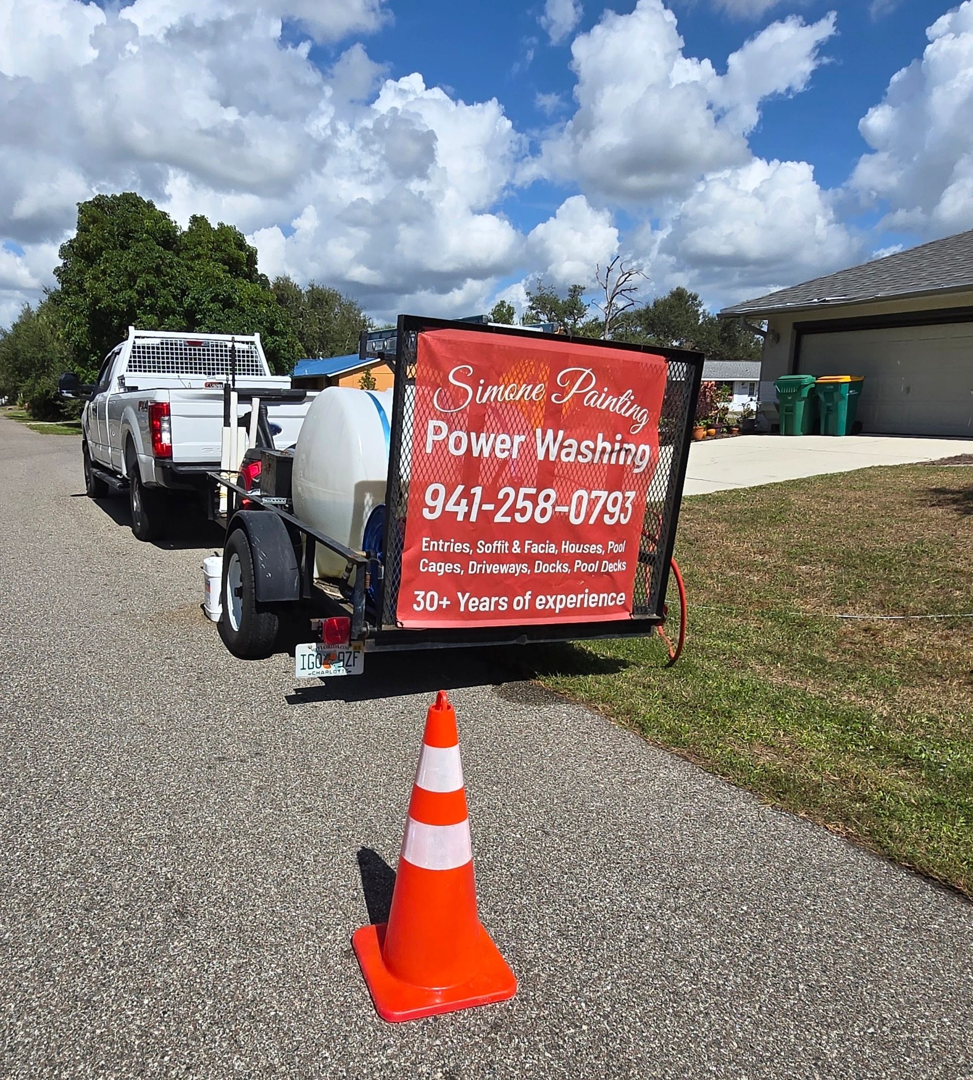 Simone Painting power washing truck and trailer at a Port Charlotte home