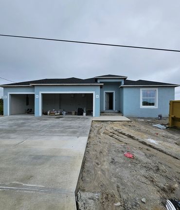 Newly painted light blue new-construction home in Port Charlotte
