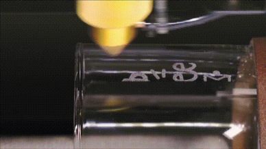 Engraving on a glass mug.
