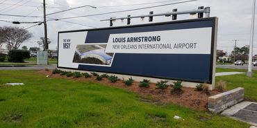 Sign for the new Louis Armstrong New Orleans International Airport.