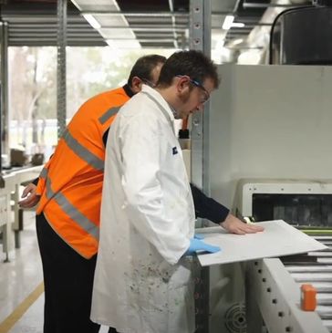 QC Architectural team discussing factory-applied coatings solutions for architectural buildinds