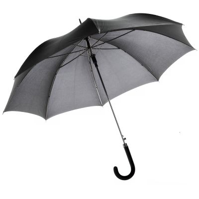 Parapluie noir ouvert qui semble voler au vent.
