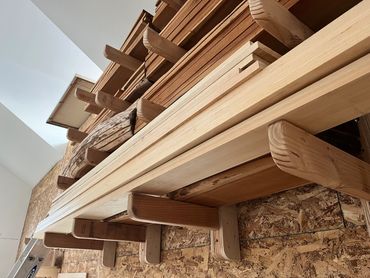 Lumber sitting in a rack.