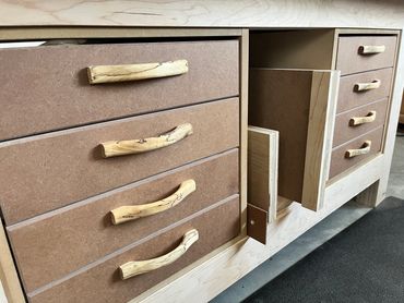 Workbench drawers with spalted ash handles.