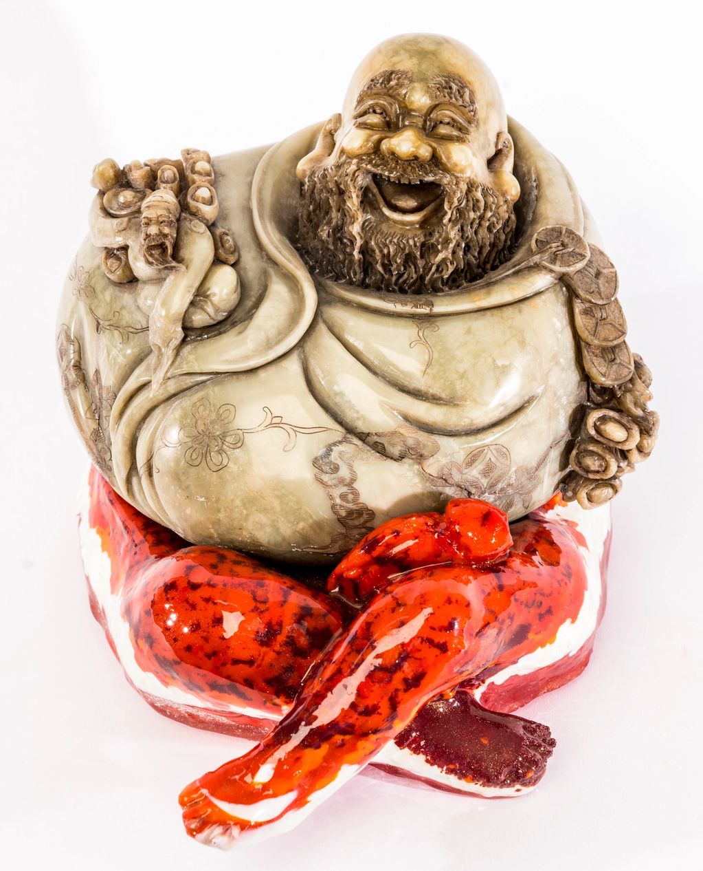 Old Chinese stone carving on a cast glass base with penis and legs 
Mixed media stone and cast glass