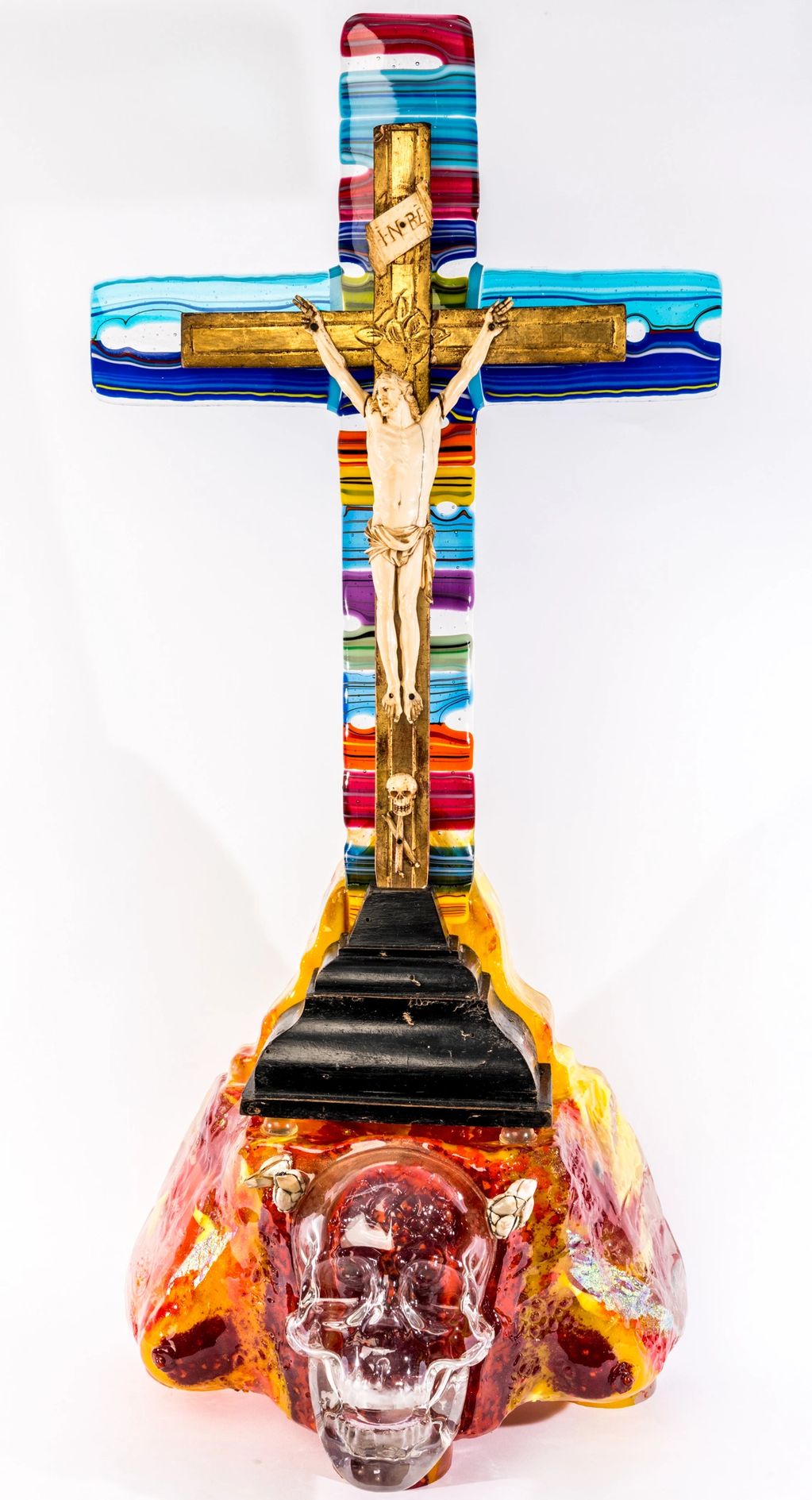 Mixed Media cast glass and Ivory crucifix from the 17th C. 24 " tall, glass skull and cast base.
$
