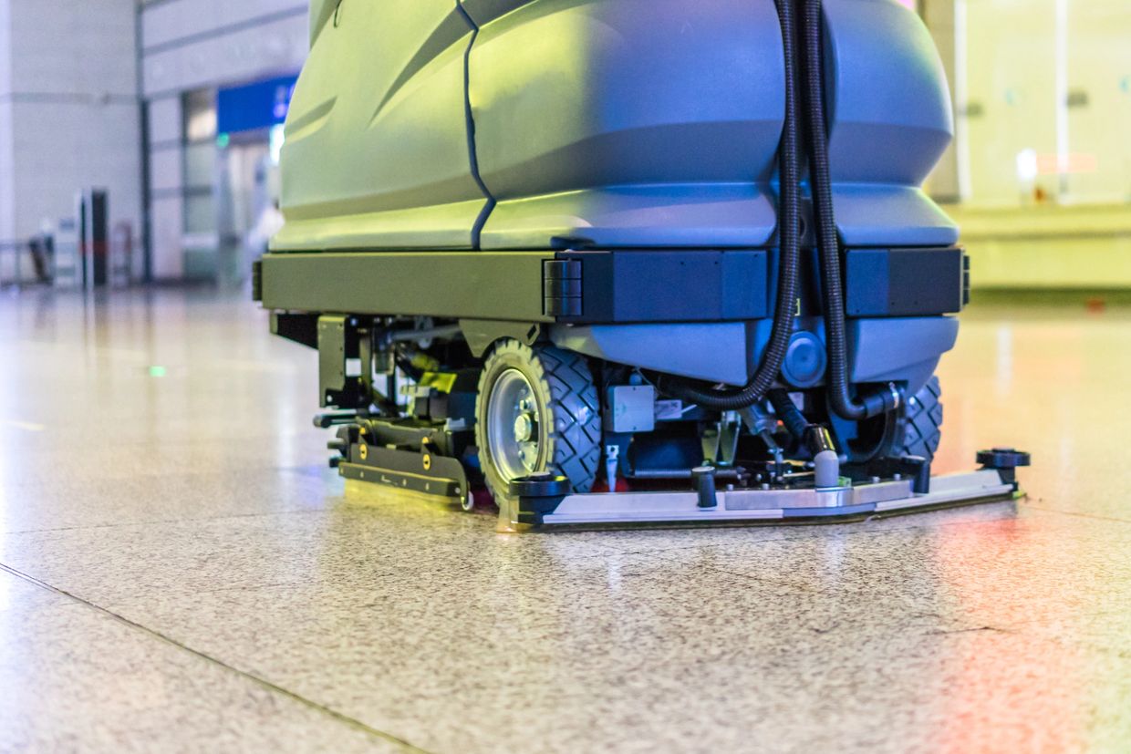 Floor care with washing machine in an office lobby