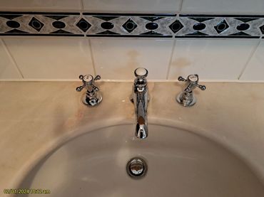 Fitted new basin taps and pop up waste