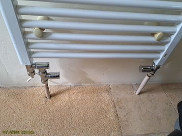 Supplied and fitted new heated towel rail element and valves