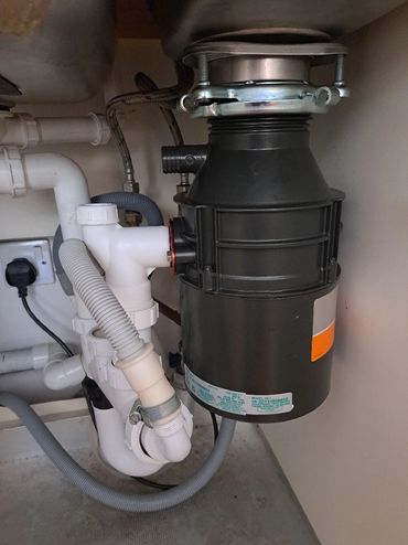 Supplied and fitted waste disposal unit