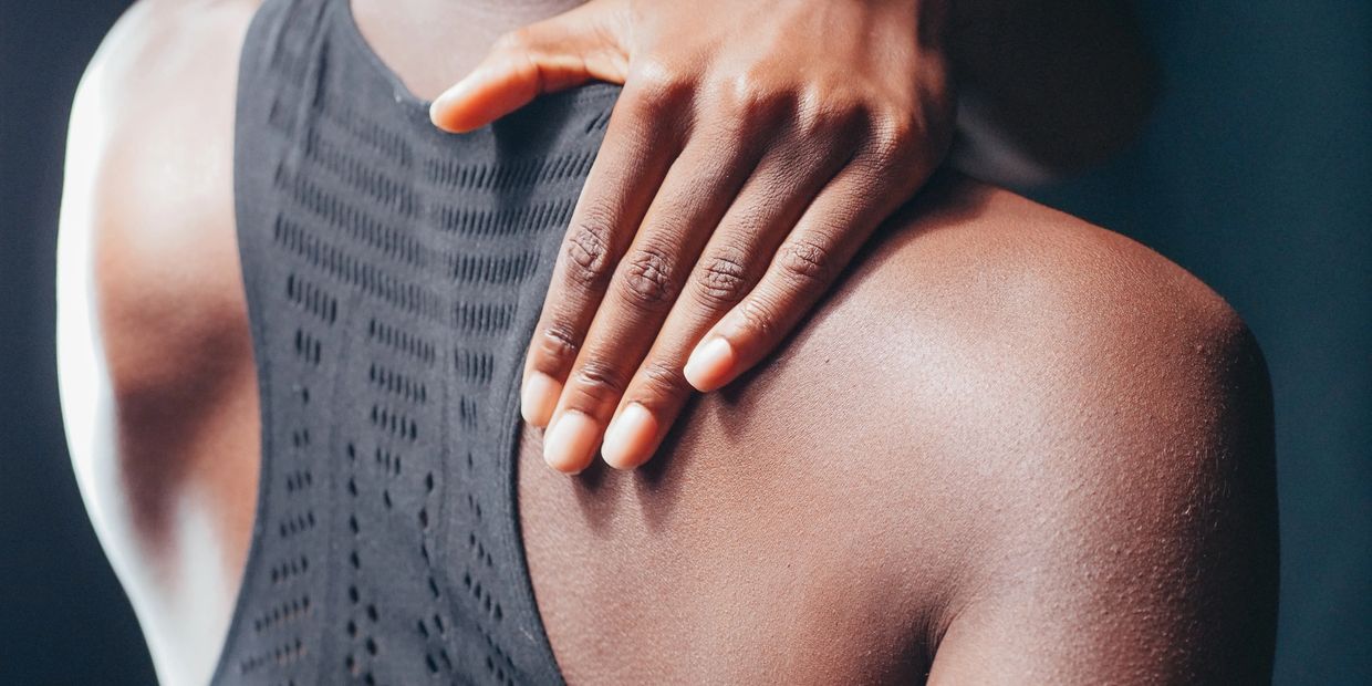 Women at work, corporate wellness back pain