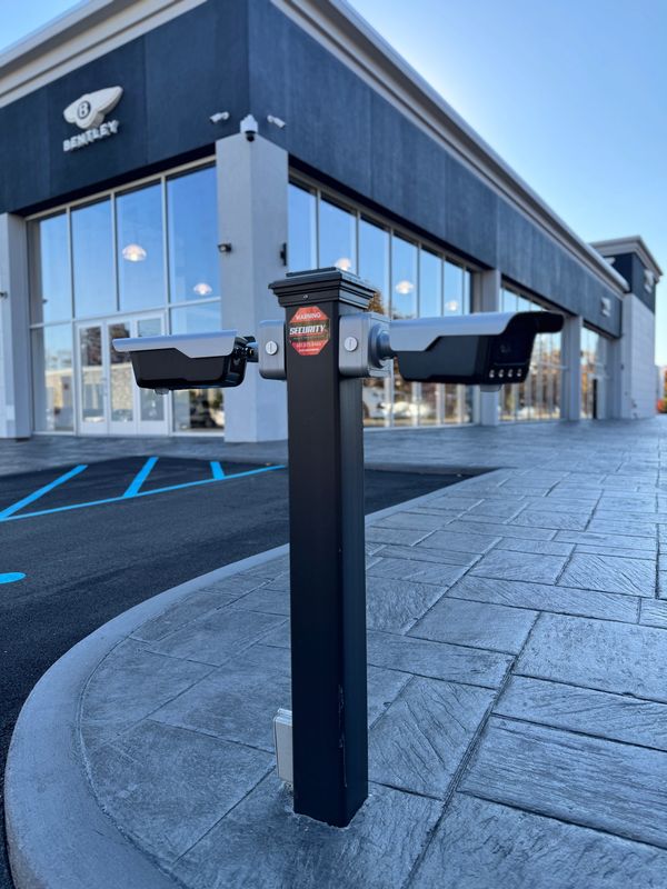 Security cameras in front of a Bentley dealership.