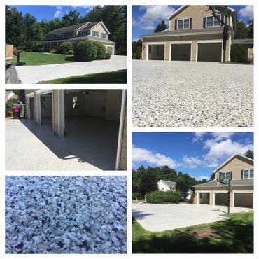 A home with a newly resurfaced, speckled garage floor and driveway under a clear sky.