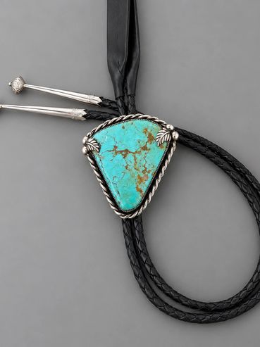 Turquoise bolo with twist wire and silver bead accents