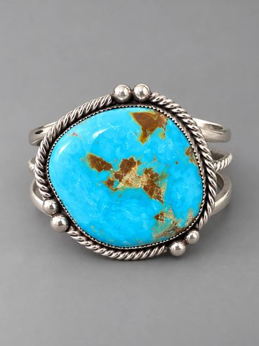 Turquoise cuff bracelet with twist wire and silver bead accents