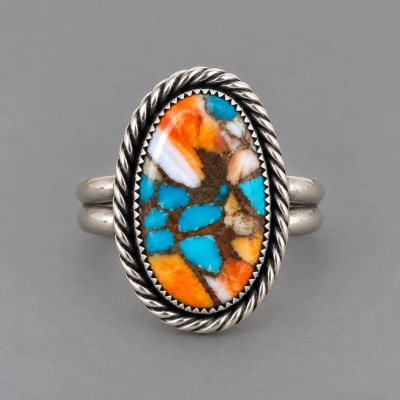 Turquoise and spiny oyster cabochon sterling silver ring with twisted wire border, size 7.