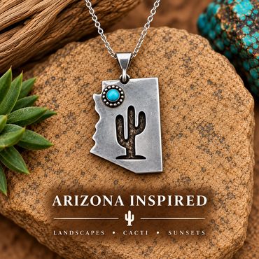 Sterling silver Arizona pendant with turquoise and saguaro. Link to explore Arizona-inspired jewelry.