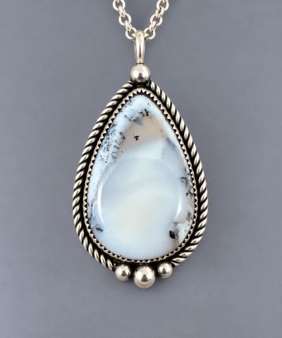 Handcrafted sterling silver pendant with teardrop dendritic agate cabochon, twisted wire and silver