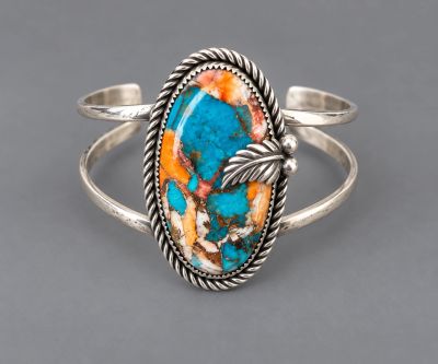 Spiny oyster and turquoise sterling silver cuff with rope border and leaf accent