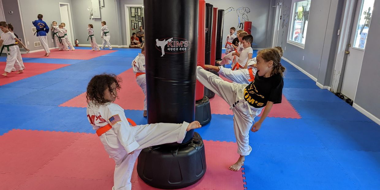 Kids Kicking at the Kim's Karate Summer Camp