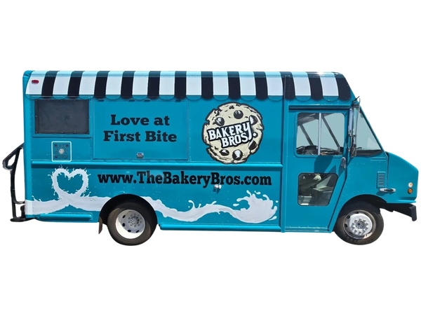 Blue Bakery Bros. food truck with cookie and slogan on side.