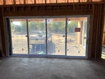 Milgard fiberglass 4-panel sliding patio door installed in El Dorado Hills, California by Solaris Wi