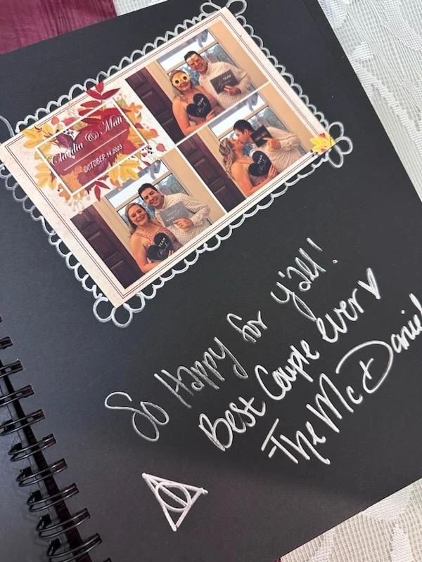 Photobooth guest book 
Guest takes a photo we tape it to the guest book and the guest signs it