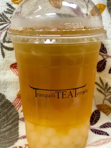 Iced black tea with lychee bubbles