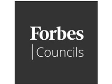 Logo of Forbes Councils in white on a dark background.