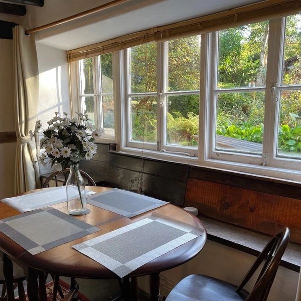 The Farmhouse dining room at Group Bookings at Family Holiday cottages mid wales 
