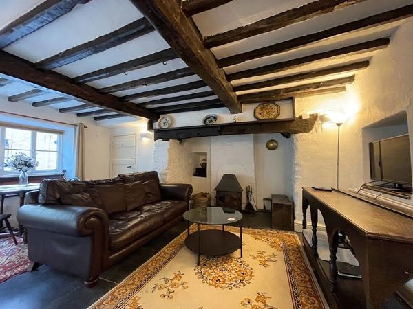 The inglenook fire place at The Farmhouse Family Holiday Cottages mid wales