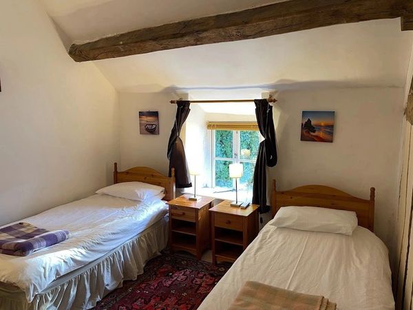 The twin bedroom at The Farmhouse, family Holiday Cottages mid wales