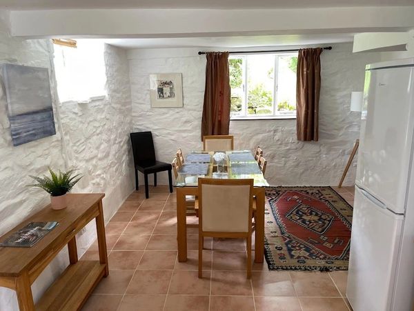 Dining room of Garden cottage, at Family Holiday Cottages, mid wales