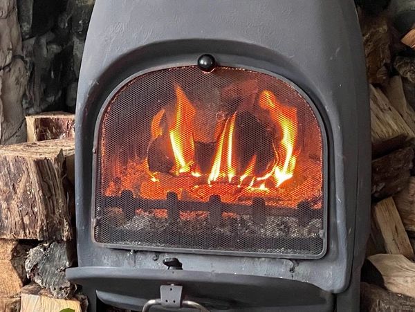 Garden Cottage wood burning stove at Family Holiday cottages mid wales