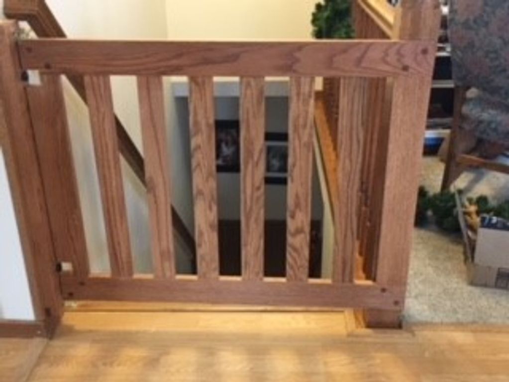 Custom baby gate to match stair rail.