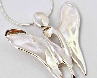 silver butterfly angel, worn by Fern Britton