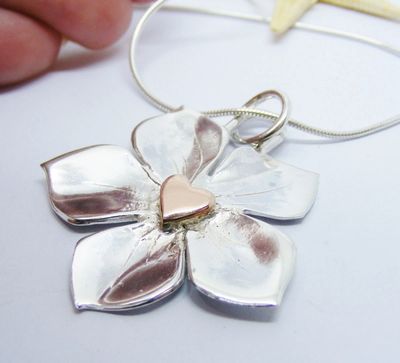 Silver Forget me not Flower pendant, with rose gold centre