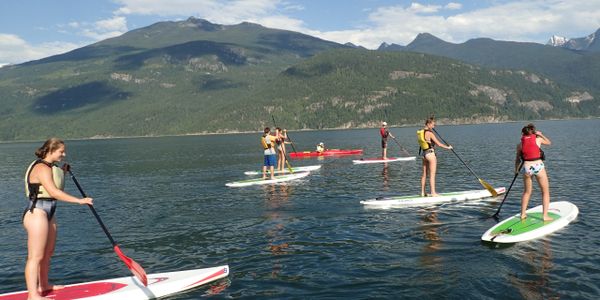 Stand Up paddle boarding on Kootenay Lake in Kaslo, BC