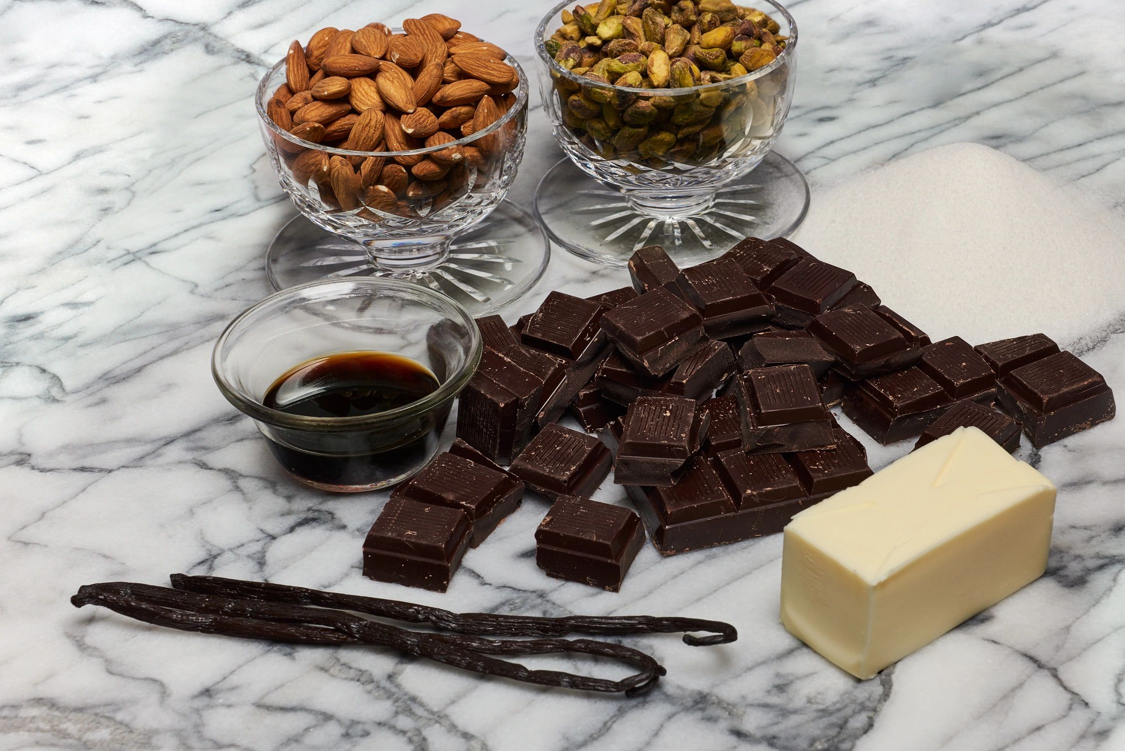 Close picture of dry fruits and chocolates kept together