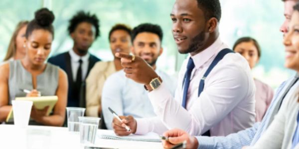 Business meeting with a speaker and attentive audience.